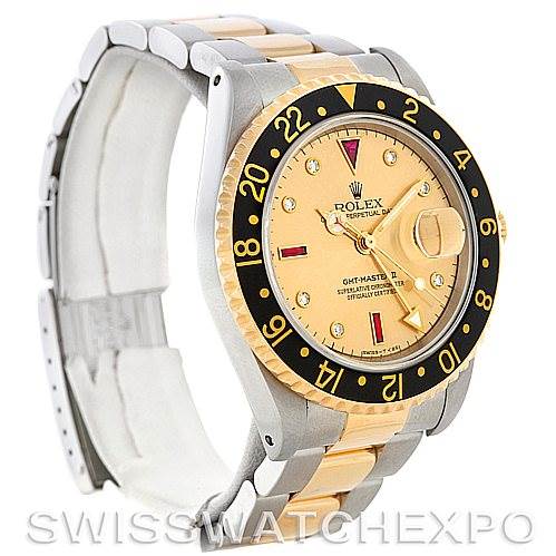 This image shows a side angle of a Rolex GMT-Master 16713 Men's Stainless Steel Champagne Dial 16713 Men's Stainless Steel Champagne Dial II watch, highlighting its gold and stainless steel bracelet and face.