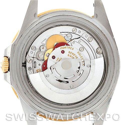 This image shows the internal mechanism and movement of a Rolex GMT-Master 16713 Men's Stainless Steel Champagne Dial 16713 Men's Stainless Steel Champagne Dial watch from the back view.