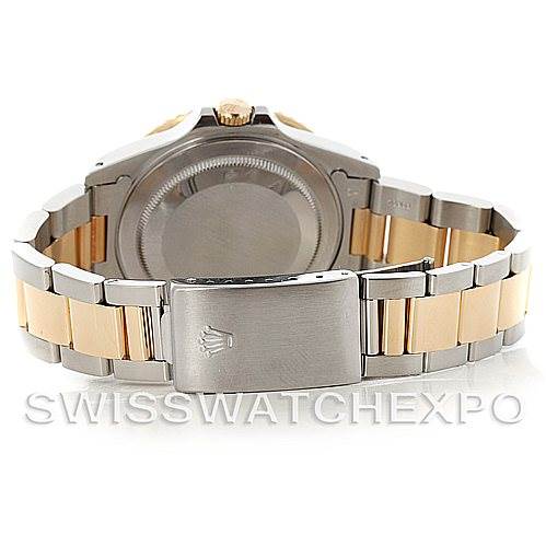 The image shows the back and bracelet of a Rolex GMT-Master 16713 Men's Stainless Steel Champagne Dial 16713 Men's Stainless Steel Champagne Dial watch, with a two-tone metal finish and a closed clasp.