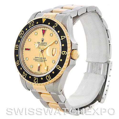 This image shows a side angle of a Rolex GMT-Master 16713 Men's Stainless Steel Champagne Dial 16713 Men's Stainless Steel Champagne Dial watch, featuring the bezel, dial, and part of the bracelet.