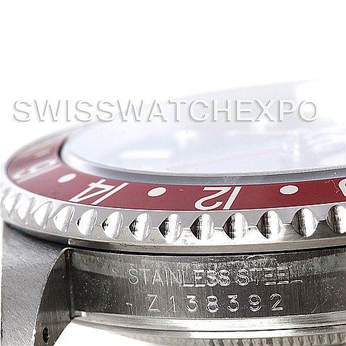The image shows a close-up of the side of a Rolex GMT-Master 16710 Men's Stainless Steel Black Dial 16710 Men's Stainless Steel Black Dial watch, focusing on its stainless steel case and part of the bezel.