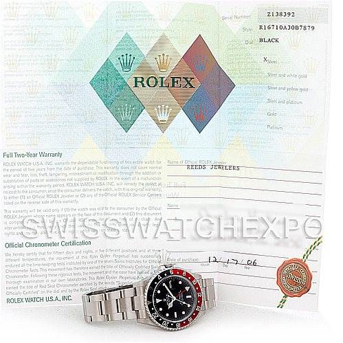 The image shows a Rolex GMT-Master 16710 Men's Stainless Steel Black Dial 16710 Men's Stainless Steel Black Dial watch and its accompanying warranty and certification documents.