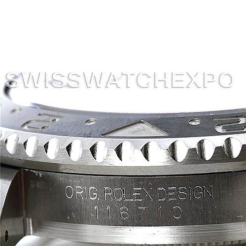 This close-up image of a Rolex GMT-Master 116710 Men's Stainless Steel Black Dial 116710 Men's Stainless Steel Black Dial watch shows the bezel with its distinct edge, alongside engraved model details on the case.