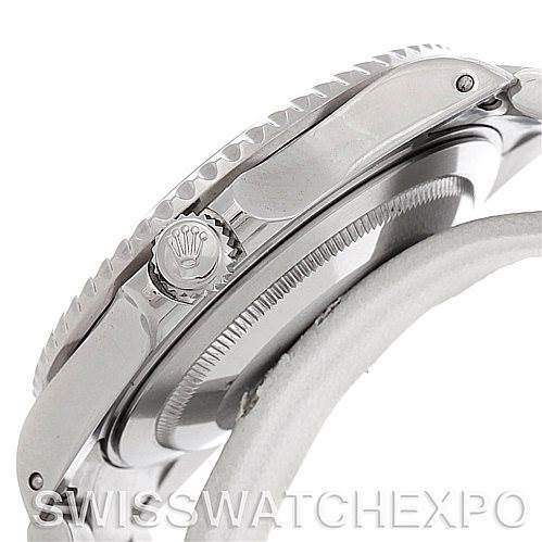 This image shows a side view of a Rolex GMT-Master 16710 Men's Stainless Steel Black Dial 16710 Men's Stainless Steel Black Dial watch emphasizing the crown, bezel, and part of the case.