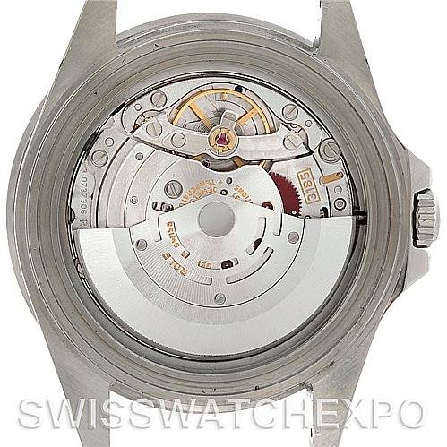 This image shows the open case back of a Rolex GMT-Master 16710 Men's Stainless Steel Black Dial 16710 Men's Stainless Steel Black Dial, revealing its movement and internal mechanisms.