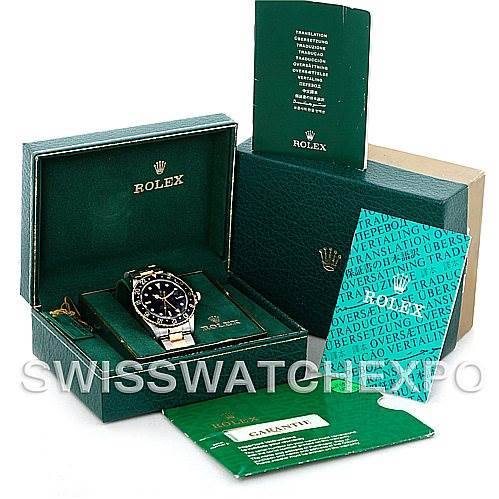 The image shows a Rolex GMT-Master 16753 Men's Stainless Steel Black Dial 16753 Men's Stainless Steel Black Dial watch and its accessories, including the box, booklets, and warranty card, from a front angle.