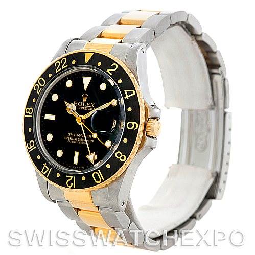 The image shows a side angle of a Rolex GMT-Master 16753 Men's Stainless Steel Black Dial 16753 Men's Stainless Steel Black Dial, highlighting its black and gold bezel, black dial, and two-tone bracelet.