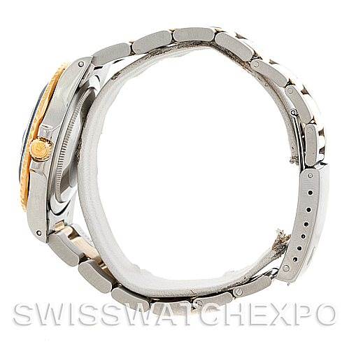 This image shows a side view of the Rolex GMT-Master 16753 Men's Stainless Steel Black Dial 16753 Men's Stainless Steel Black Dial watch, highlighting its bracelet, clasp, bezel, and crown.