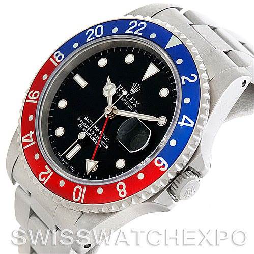 The image shows a close-up of the Rolex GMT-Master 16700 Men's Stainless Steel Black Dial 16700 Men's Stainless Steel Black Dial watch, highlighting the bezel, dial, crown, and part of the bracelet.