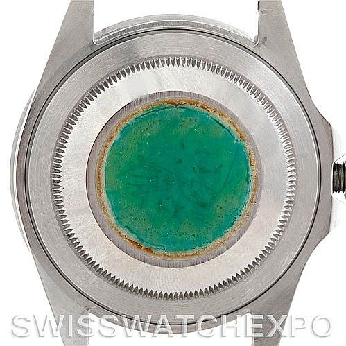 This is an image of the back case of a Rolex GMT-Master 16700 Men's Stainless Steel Black Dial 16700 Men's Stainless Steel Black Dial watch, viewed from a top-down angle.