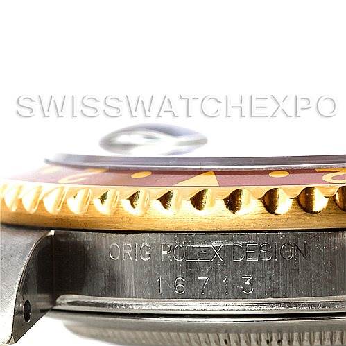 The image shows a close-up side angle of the Rolex GMT-Master 16713 Men
s Stainless Steel Brown Dial 16713 Men
s Stainless Steel Brown Dial watch, highlighting the bezel and case markings.
