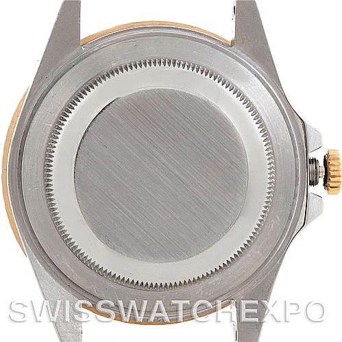 This image shows the back case of a Rolex GMT-Master 16713 Men
s Stainless Steel Brown Dial 16713 Men
s Stainless Steel Brown Dial watch from a top-down angle with the crown on the right.