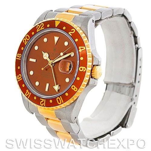 This image shows an angled view of a Rolex GMT-Master 16713 Men
s Stainless Steel Brown Dial 16713 Men
s Stainless Steel Brown Dial watch featuring its bezel, dial, case, and bracelet.