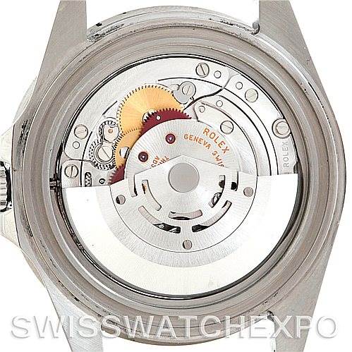 The image shows the movement mechanism of a Rolex GMT-Master 16710 Men's Stainless Steel Black Dial 16710 Men's Stainless Steel Black Dial watch from the back, exposing its intricate internal parts.