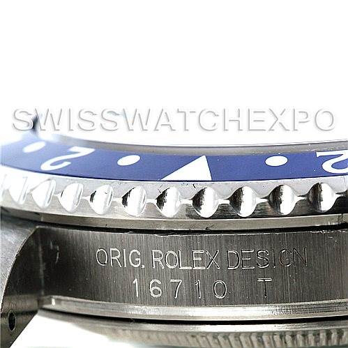 The image shows a close-up of the side of a Rolex GMT-Master 16710 Men's Stainless Steel Black Dial 16710 Men's Stainless Steel Black Dial bezel and case engraving with the model number 16710.