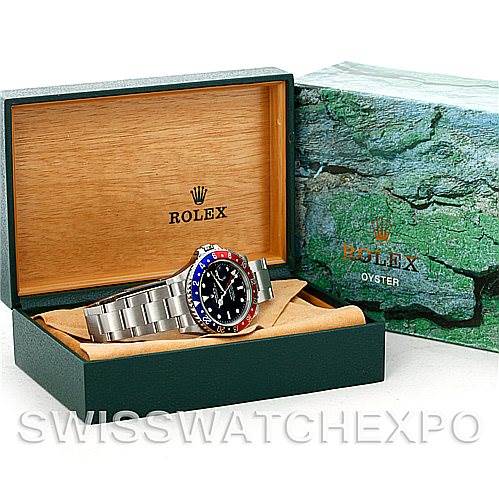 This image shows a Rolex GMT-Master 16710 Men's Stainless Steel Black Dial 16710 Men's Stainless Steel Black Dial watch at an angle, displayed in its original box with the outer packaging visible.