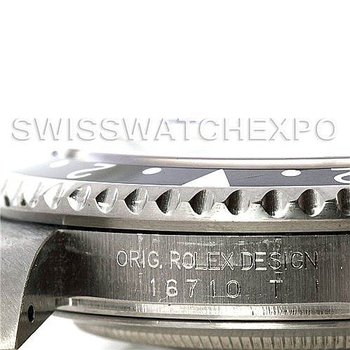 This angled close-up of the Rolex GMT-Master 16710 Men's Stainless Steel Black Dial 16710 Men's Stainless Steel Black Dial shows the watch's bezel and side case with its model number "16710."
