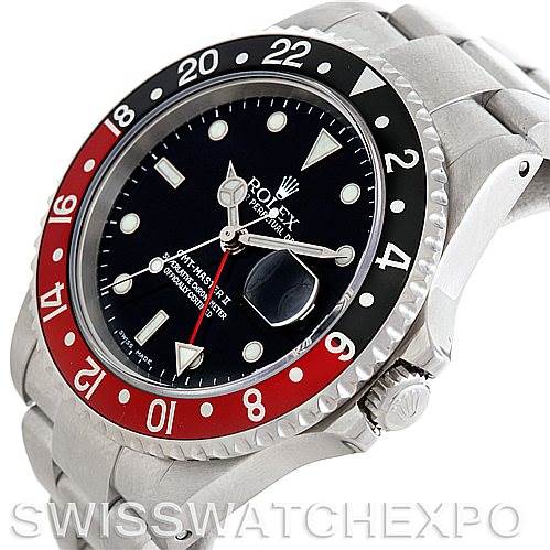 The image shows a close-up of a Rolex GMT-Master 16710 Men's Stainless Steel Black Dial 16710 Men's Stainless Steel Black Dial watch, highlighting its bezel, crown, dial, and bracelet from an angled side view.