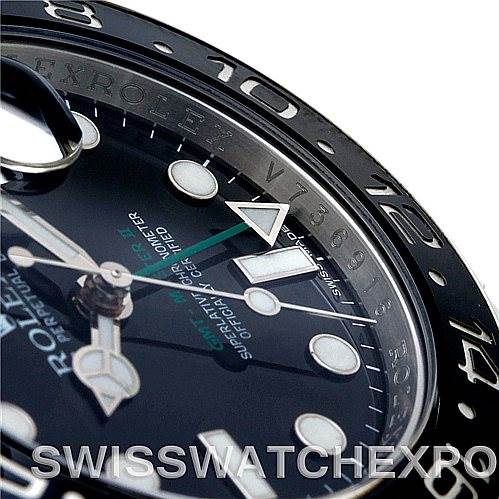 This close-up angle of the Rolex GMT-Master 116710 Men's Stainless Steel Black Dial 116710 Men's Stainless Steel Black Dial shows the dial, hands, and part of the bezel.