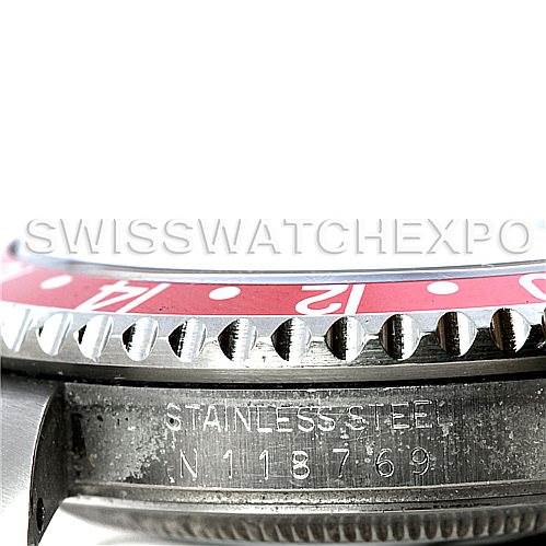 The image shows a close-up of the bezel and the side of the case of a Rolex GMT-Master 16700 Men's Stainless Steel Black Dial 16700 Men's Stainless Steel Black Dial watch, displaying the serial number.