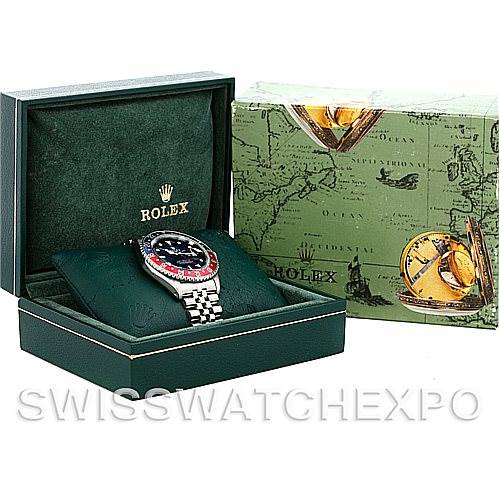 The image shows a Rolex GMT-Master 16700 Men's Stainless Steel Black Dial 16700 Men's Stainless Steel Black Dial watch in its box with the outer packaging visible.