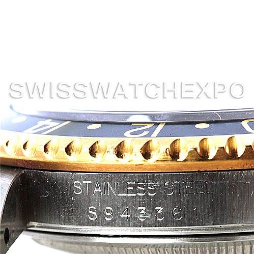 This image shows a close-up of the bezel and case side of a Rolex GMT-Master 16713 Men's Stainless Steel Champagne Dial 16713 Men's Stainless Steel Champagne Dial watch, highlighting the stainless steel and serial number.