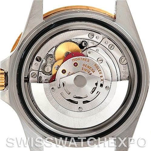 The image shows the internal mechanism of a Rolex GMT-Master 16713 Men's Stainless Steel Champagne Dial 16713 Men's Stainless Steel Champagne Dial watch from a rear view angle with the case back removed.