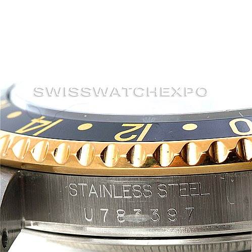 This image shows a close-up of the case side and bezel of a Rolex GMT-Master 16713 Men's Stainless Steel Black Dial 16713 Men's Stainless Steel Black Dial watch.