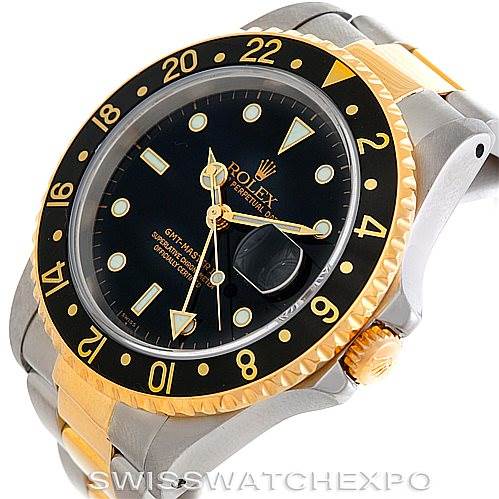 This image shows a side angle of the Rolex GMT-Master 16713 Men's Stainless Steel Black Dial 16713 Men's Stainless Steel Black Dial watch, highlighting its bezel, crown, dial, and bracelet.