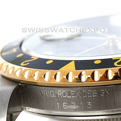 The image shows a side angle of a Rolex GMT-Master 16713 Men's Stainless Steel Black Dial 16713 Men's Stainless Steel Black Dial watch, highlighting the bezel, crystal, and the engraved model number "16713".