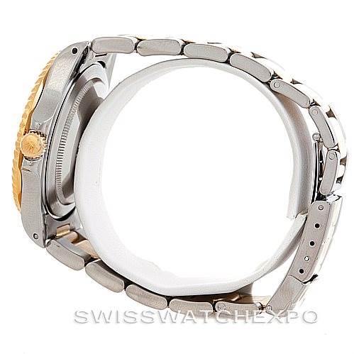 The image shows a side view of a Rolex GMT-Master 16713 Men's Stainless Steel Black Dial 16713 Men's Stainless Steel Black Dial watch, highlighting the crown, bezel, and metal bracelet.