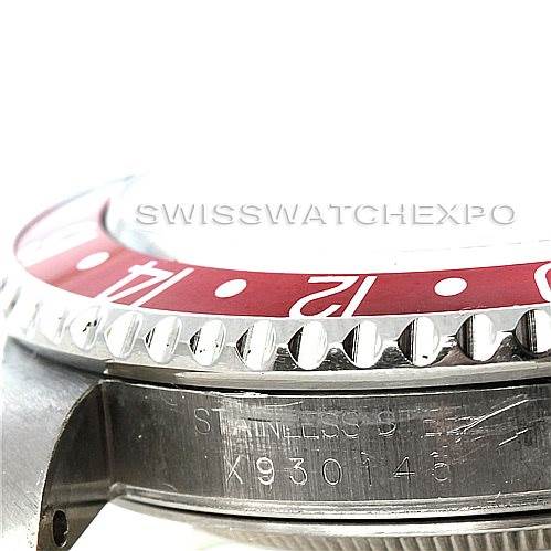 This image shows the side view of the bezel and case of a Rolex GMT-Master 16710 Men's Stainless Steel Black Dial 16710 Men's Stainless Steel Black Dial, focusing on the bezel edge and serial number.