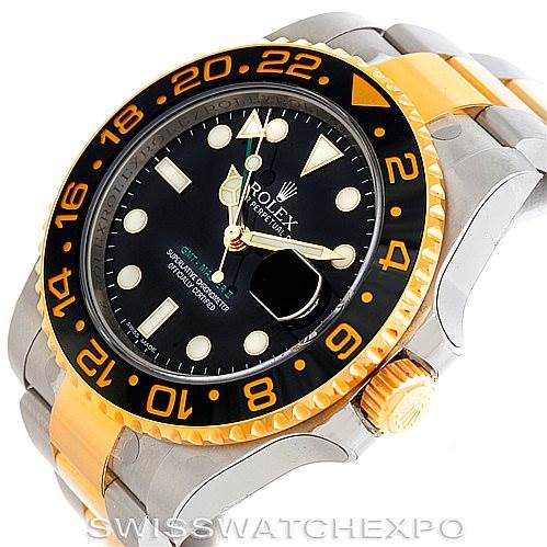 This image shows a Rolex GMT-Master 116713 Men's Stainless Steel Black Dial 116713 Men's Stainless Steel Black Dial watch, highlighting its black dial, two-tone bezel, and gold and silver bracelet from a slightly top-down angle.