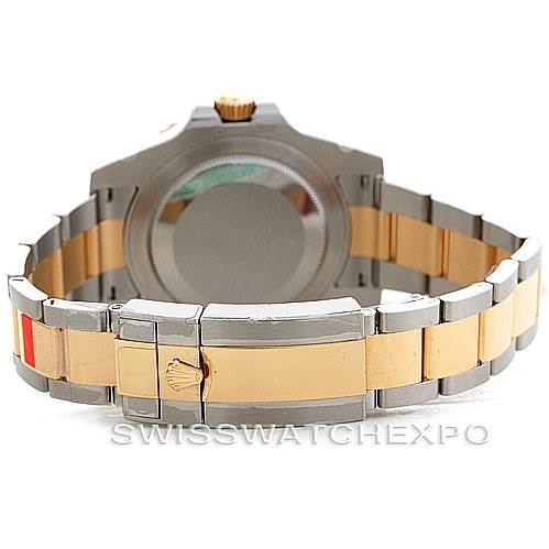 The image shows the backside of a Rolex GMT-Master 116713 Men's Stainless Steel Black Dial 116713 Men's Stainless Steel Black Dial watch, featuring the caseback, crown, and two-tone bracelet.