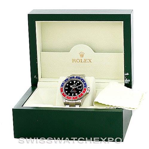 The Rolex GMT-Master 16710 Men's Stainless Steel Black Dial 16710 Men's Stainless Steel Black Dial watch is shown front-on in its green and cream box, with a visible bezel and dial.