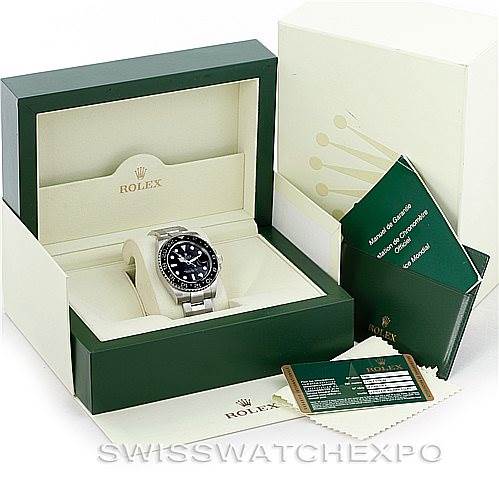 The image shows a Rolex GMT-Master 116710 Men's Stainless Steel Black Dial 116710 Men's Stainless Steel Black Dial watch and its accessories, including the box, manuals, and warranty card.