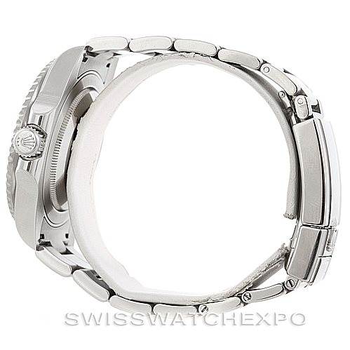 This is a side view of a Rolex GMT-Master 116710 Men's Stainless Steel Black Dial 116710 Men's Stainless Steel Black Dial watch showcasing its metallic bracelet and crown.