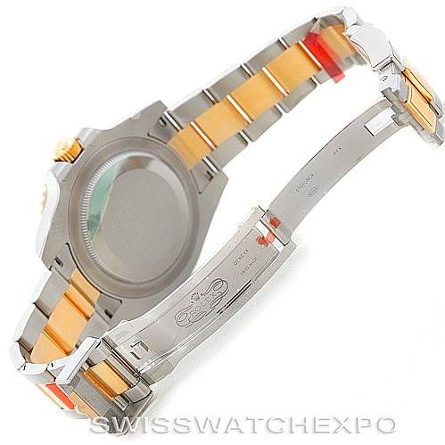 This image shows the underside and clasp of the Rolex GMT-Master 116713 Men's Stainless Steel Black Dial 116713 Men's Stainless Steel Black Dial watch with its bracelet partially unfolded.