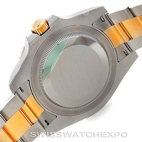 The image shows the backside and part of the bracelet of a Rolex GMT-Master 116713 Men's Stainless Steel Black Dial 116713 Men's Stainless Steel Black Dial watch, highlighting the case back and crown.