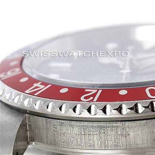 The image shows a close-up side angle of the Rolex GMT-Master 16710 Men's Stainless Steel Black Dial 16710 Men's Stainless Steel Black Dial watch, highlighting the bezel, dial, and part of the casing with engraved details.