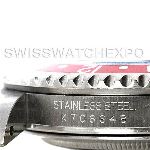 Close-up of the side of a Rolex GMT-Master 16710 Men's Stainless Steel Black Dial 16710 Men's Stainless Steel Black Dial watch, showcasing the stainless steel case and serial number engraving.