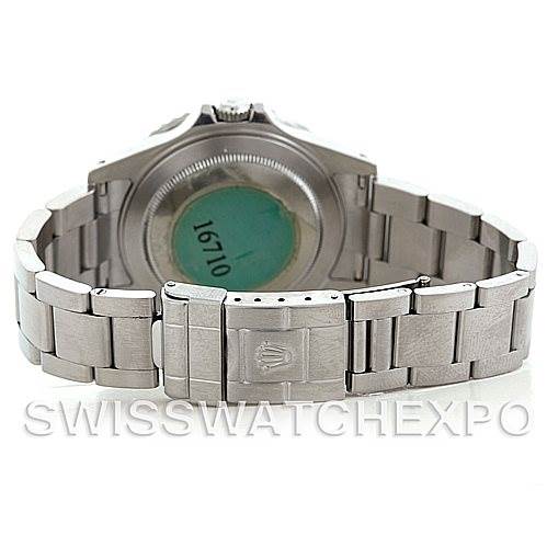 This image shows the back side of the Rolex GMT-Master 16710 Men's Stainless Steel Black Dial 16710 Men's Stainless Steel Black Dial watch, including the case back and the bracelet with the clasp.