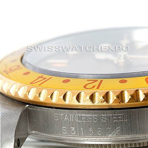 The image shows a close-up of the side of a Rolex GMT-Master 16713 Men's Stainless Steel Brown Dial 16713 Men's Stainless Steel Brown Dial, focusing on the bezel and partially visible serial number on the case.