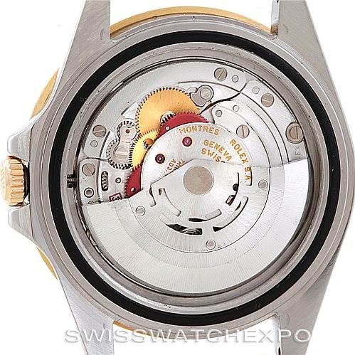 The image shows the internal movement mechanism of a Rolex GMT-Master 16713 Men's Stainless Steel Brown Dial 16713 Men's Stainless Steel Brown Dial watch from a rear angle with the case back removed.