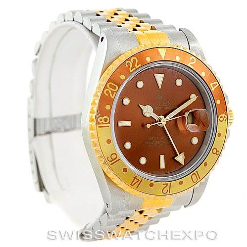 The image displays a Rolex GMT-Master 16713 Men's Stainless Steel Brown Dial 16713 Men's Stainless Steel Brown Dial watch from a front-side angle, showcasing its brown dial, bezel, and two-tone bracelet.