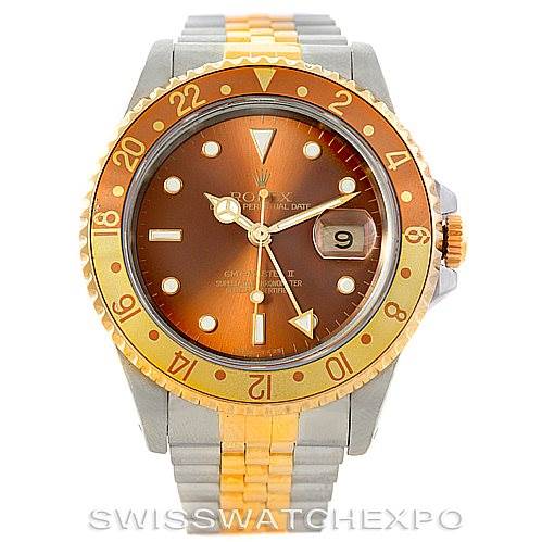 The image shows a front view of a Rolex GMT-Master 16713 Men's Stainless Steel Brown Dial 16713 Men's Stainless Steel Brown Dial watch, displaying its brown dial, gold bezel, and two-tone bracelet.