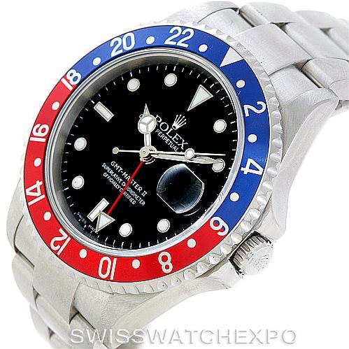 The image shows a Rolex GMT-Master 16710 Men's Stainless Steel Black Dial 16710 Men's Stainless Steel Black Dial watch angled from the front-left, highlighting its red and blue bezel and stainless steel bracelet.
