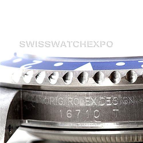 The image shows a close-up of a Rolex GMT-Master 16710 Men's Stainless Steel Black Dial 16710 Men's Stainless Steel Black Dial watch focusing on the bezel and the engraved reference number on the case.