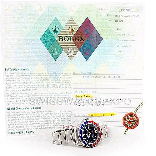 The image shows a Rolex GMT-Master 16710 Men's Stainless Steel Black Dial 16710 Men's Stainless Steel Black Dial watch along with its warranty and certification documents, displayed from a front angle.