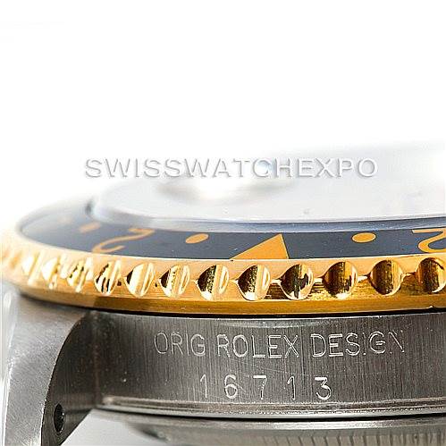An angled close-up of the Rolex GMT-Master 16713 Men's Stainless Steel Champagne Dial 16713 Men's Stainless Steel Champagne Dial model shows the side of the case, bezel, and model number "16713."